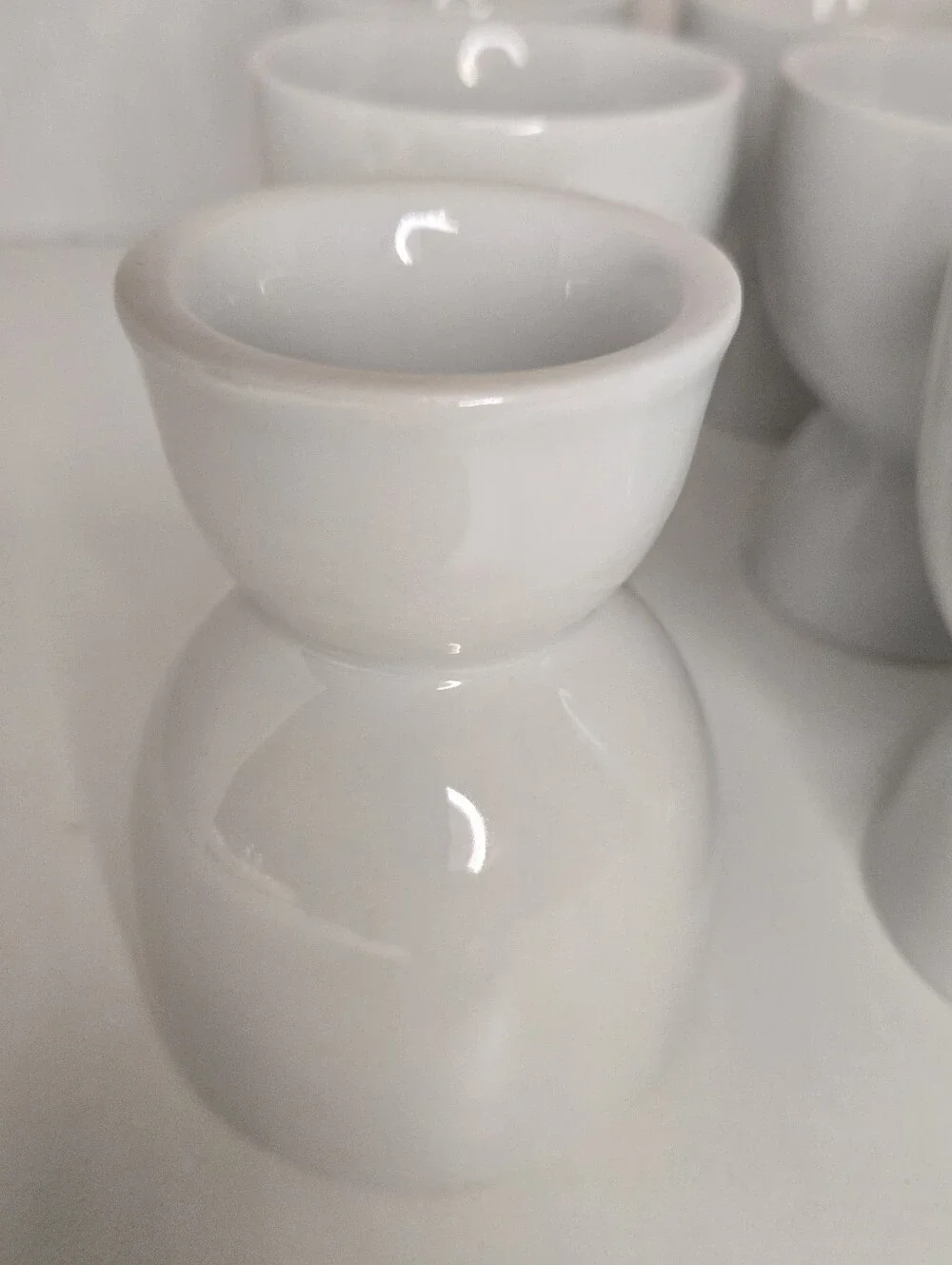 Set of 12 White Porcelain Double Egg Cups